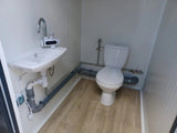 Contenedor sanitario doble de 2 cabinas