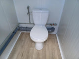 Contenedor sanitario doble de 2 cabinas